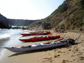 sea kayaks in sandy beaches in south Kefalonia